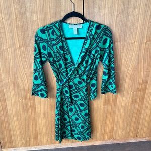 Green and black silk DVF wrap dress